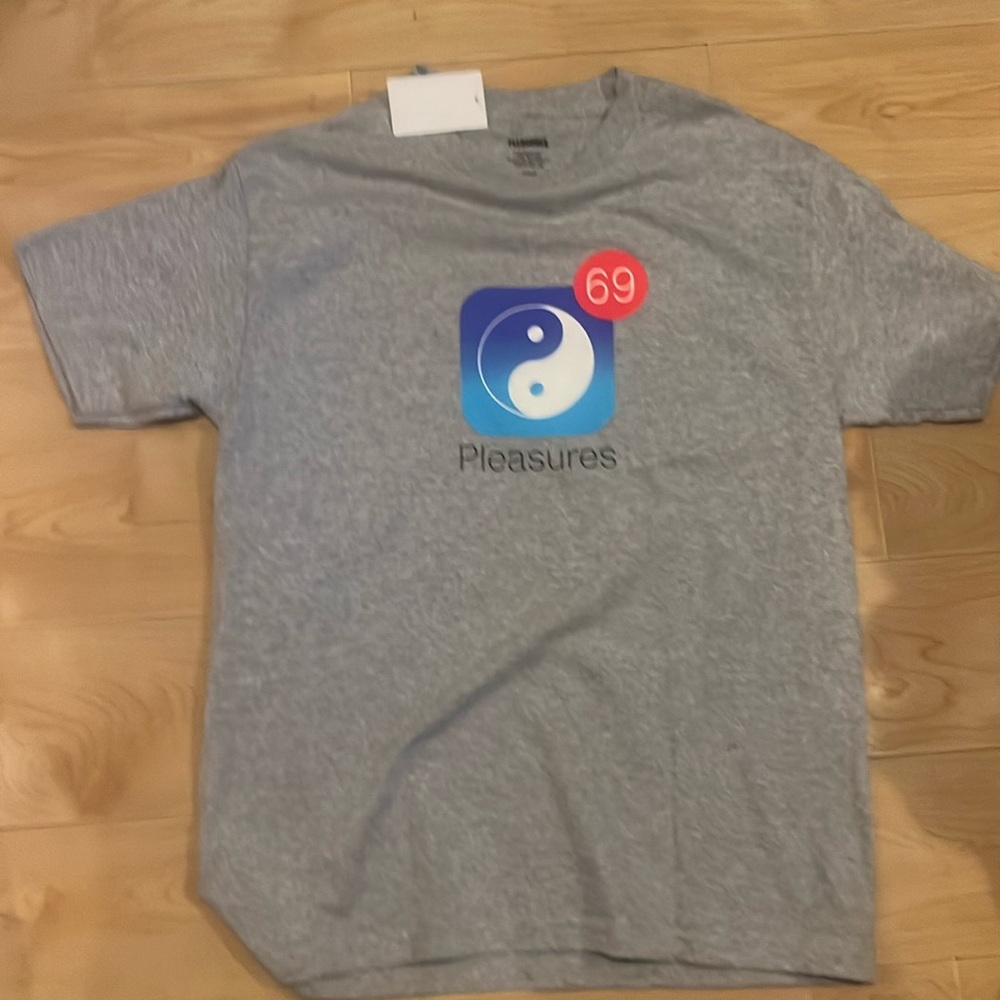 Brand new with tag Pleasures T-shirt